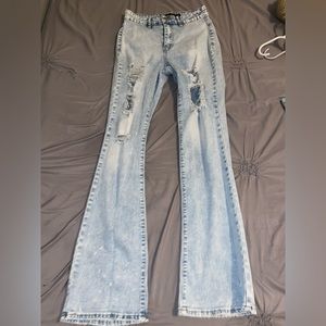 Light wash distressed boot cut jeans